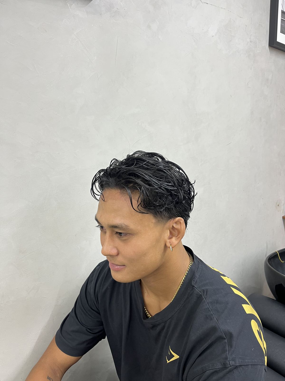 Swept-back styled cut, side view